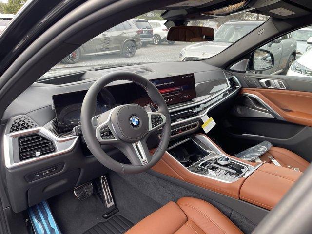 new 2025 BMW X6 car, priced at $111,385