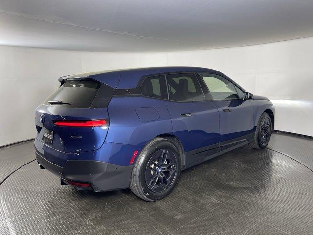 used 2024 BMW iX car, priced at $64,999