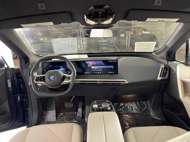 used 2024 BMW iX car, priced at $64,999