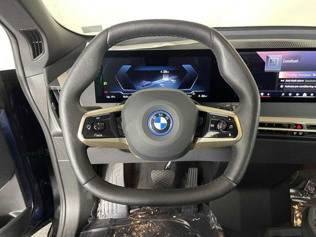 used 2024 BMW iX car, priced at $64,999