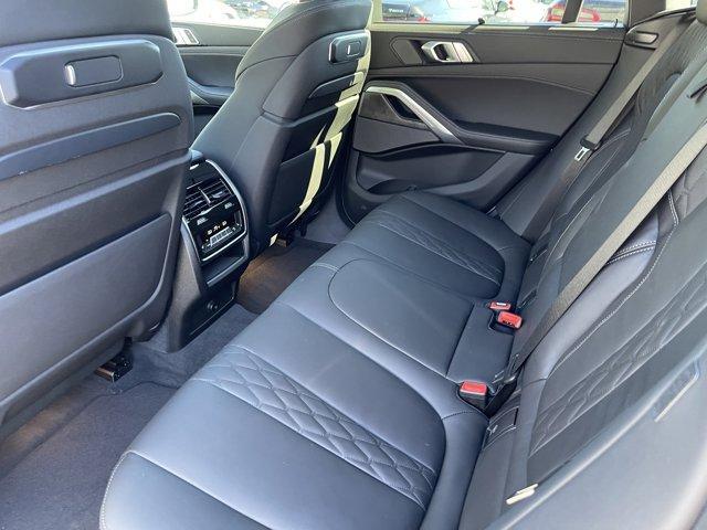 used 2025 BMW X6 car, priced at $76,779