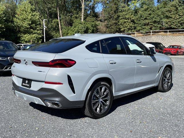 used 2025 BMW X6 car, priced at $76,779