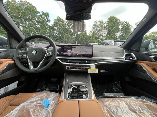 used 2026 BMW X5 PHEV car, priced at $82,250