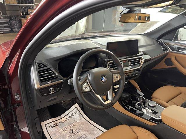 used 2025 BMW X4 car, priced at $55,999