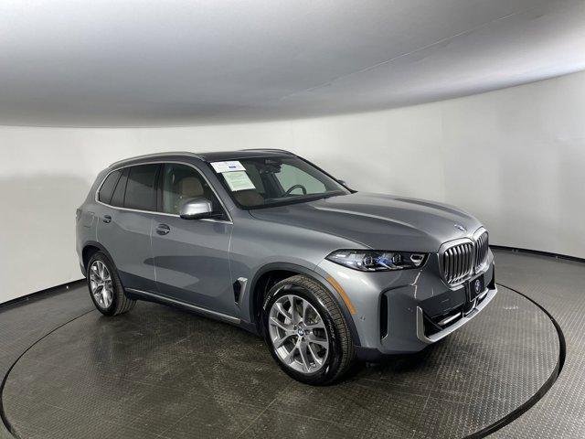 used 2024 BMW X5 car, priced at $66,100