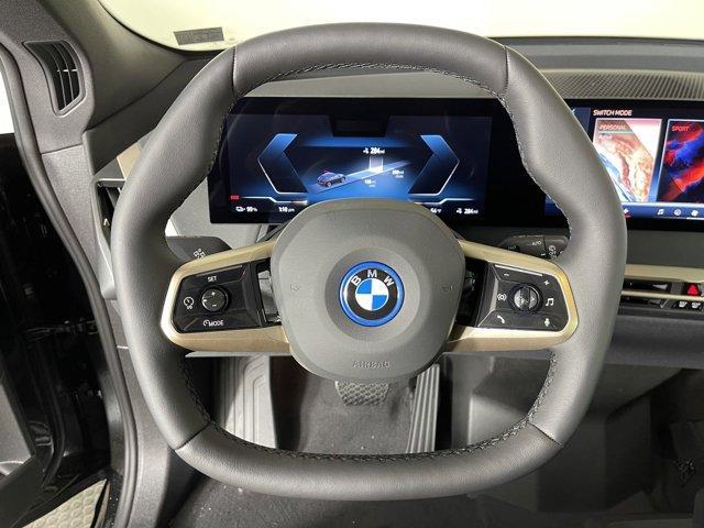 new 2024 BMW iX car, priced at $98,355