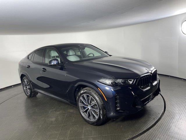 new 2025 BMW X6 car, priced at $83,885