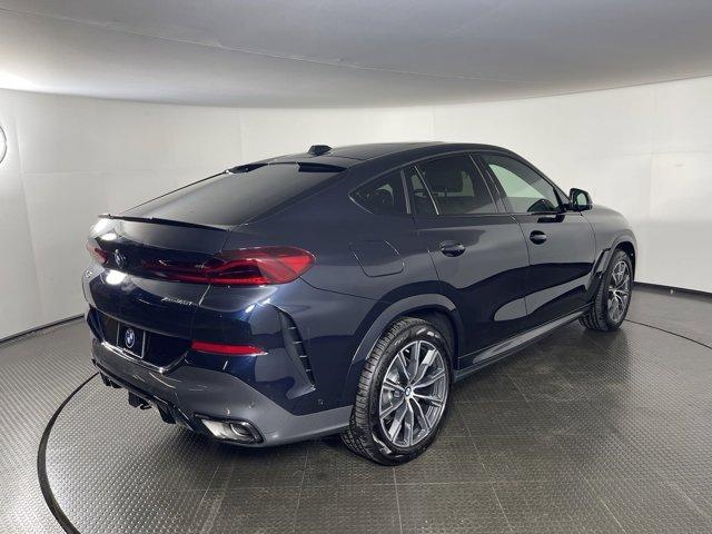 new 2025 BMW X6 car, priced at $83,885