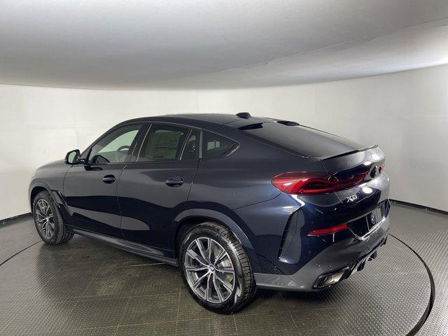 new 2025 BMW X6 car, priced at $83,885