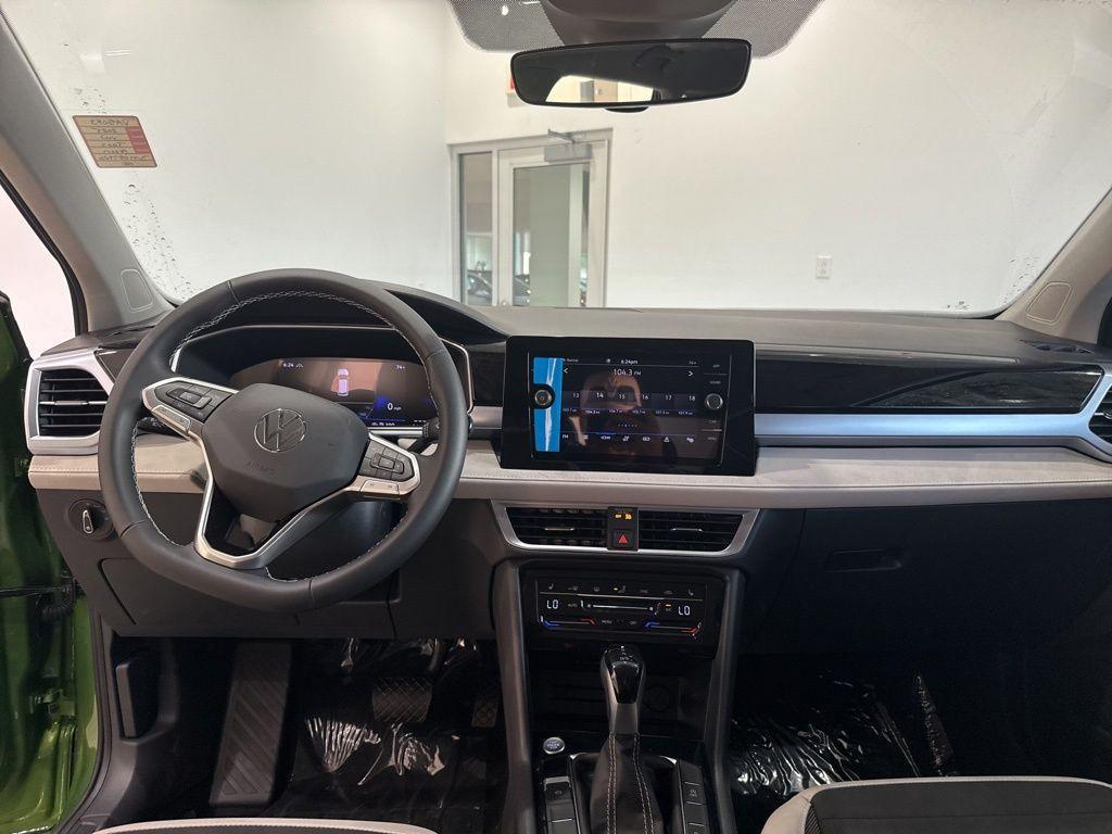 new 2025 Volkswagen Taos car, priced at $31,587