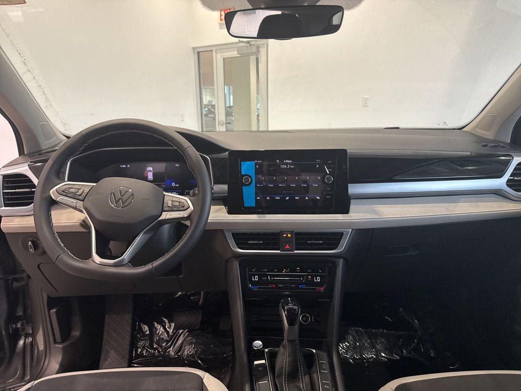 new 2025 Volkswagen Taos car, priced at $32,332