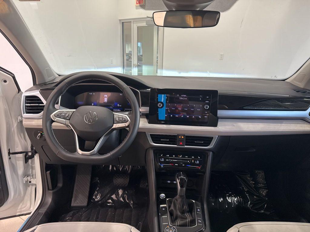new 2025 Volkswagen Taos car, priced at $32,332