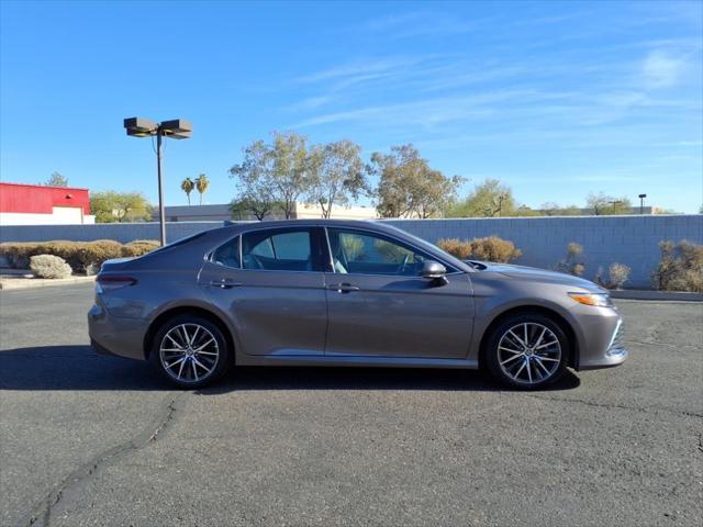 used 2022 Toyota Camry Hybrid car, priced at $25,000