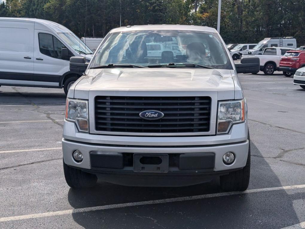 used 2014 Ford F-150 car, priced at $12,000