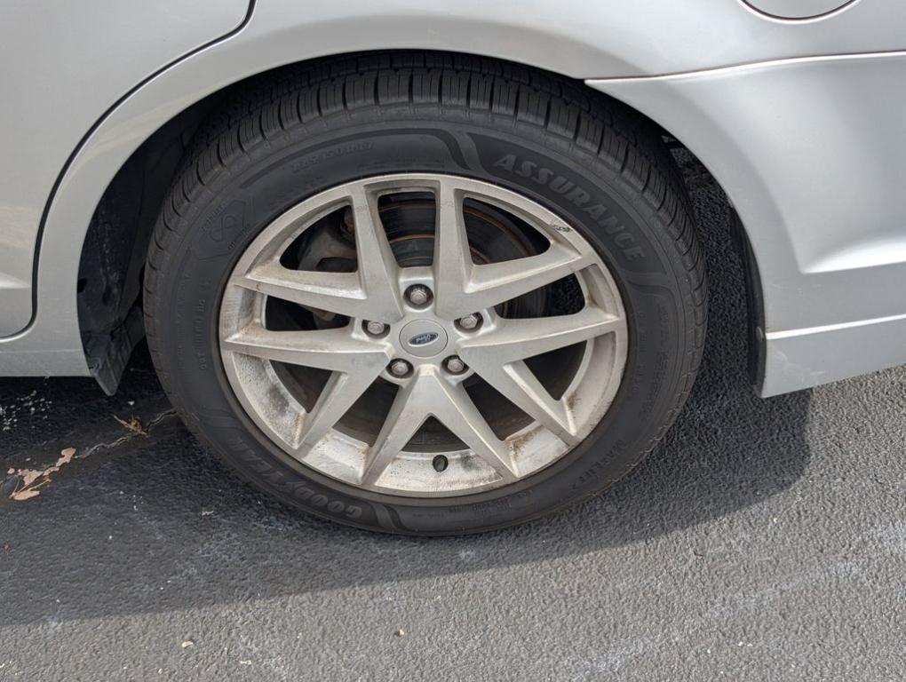 used 2012 Ford Fusion car, priced at $7,500