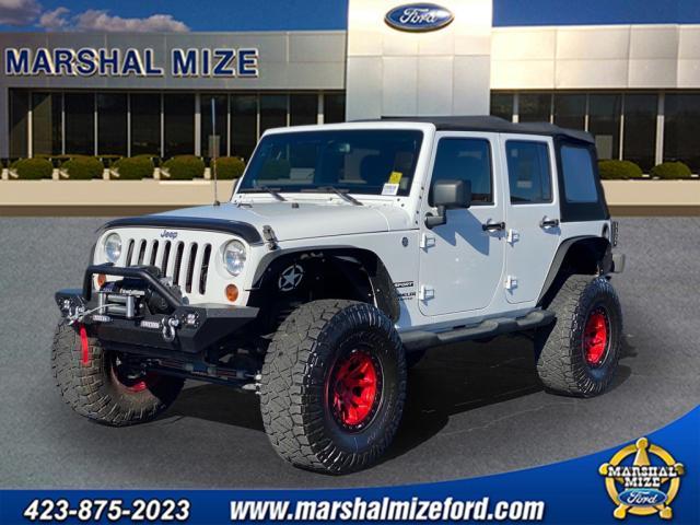 used 2013 Jeep Wrangler Unlimited car, priced at $17,881