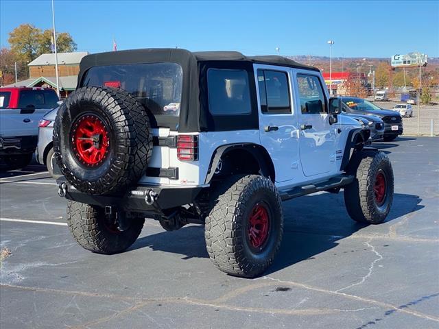 used 2013 Jeep Wrangler Unlimited car, priced at $17,300