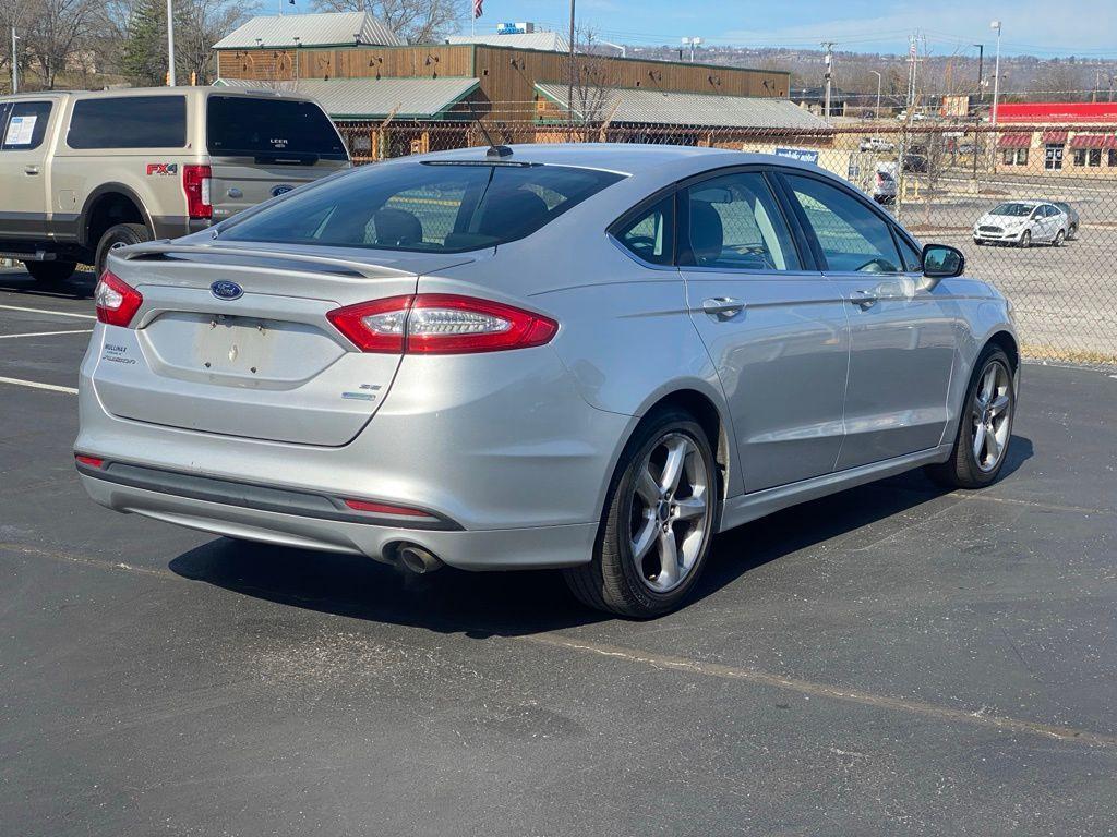 used 2015 Ford Fusion car, priced at $10,000