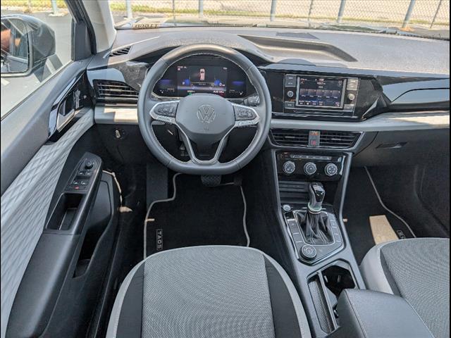 used 2023 Volkswagen Taos car, priced at $16,882