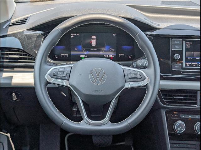 used 2023 Volkswagen Taos car, priced at $16,882