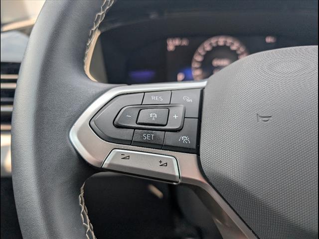used 2023 Volkswagen Taos car, priced at $16,882