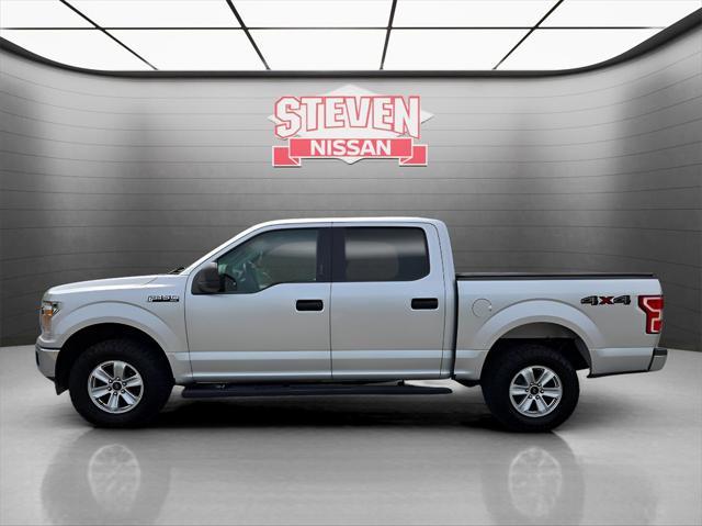 used 2018 Ford F-150 car, priced at $23,353