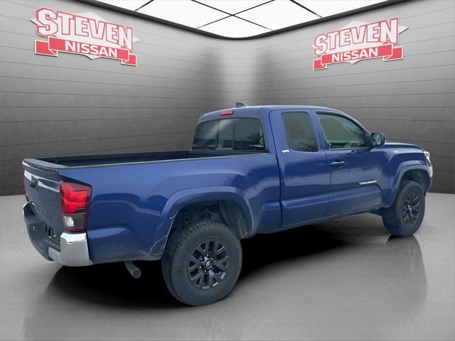 used 2022 Toyota Tacoma car, priced at $30,179