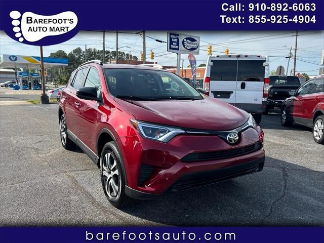 used 2018 Toyota RAV4 car, priced at $19,090