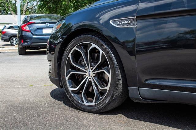 used 2016 Ford Taurus car, priced at $14,000