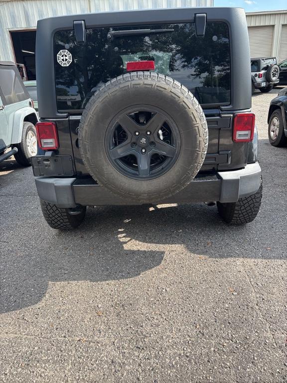 used 2018 Jeep Wrangler JK Unlimited car, priced at $22,995