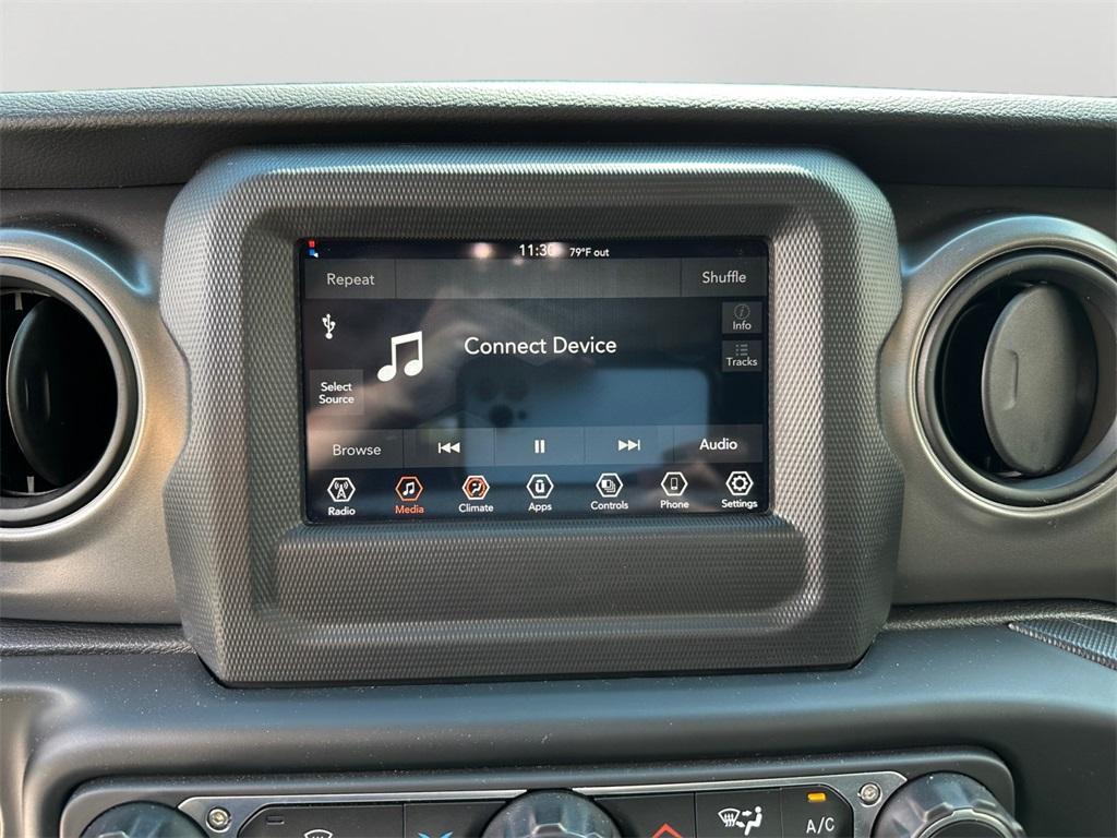 used 2023 Jeep Wrangler car, priced at $35,870