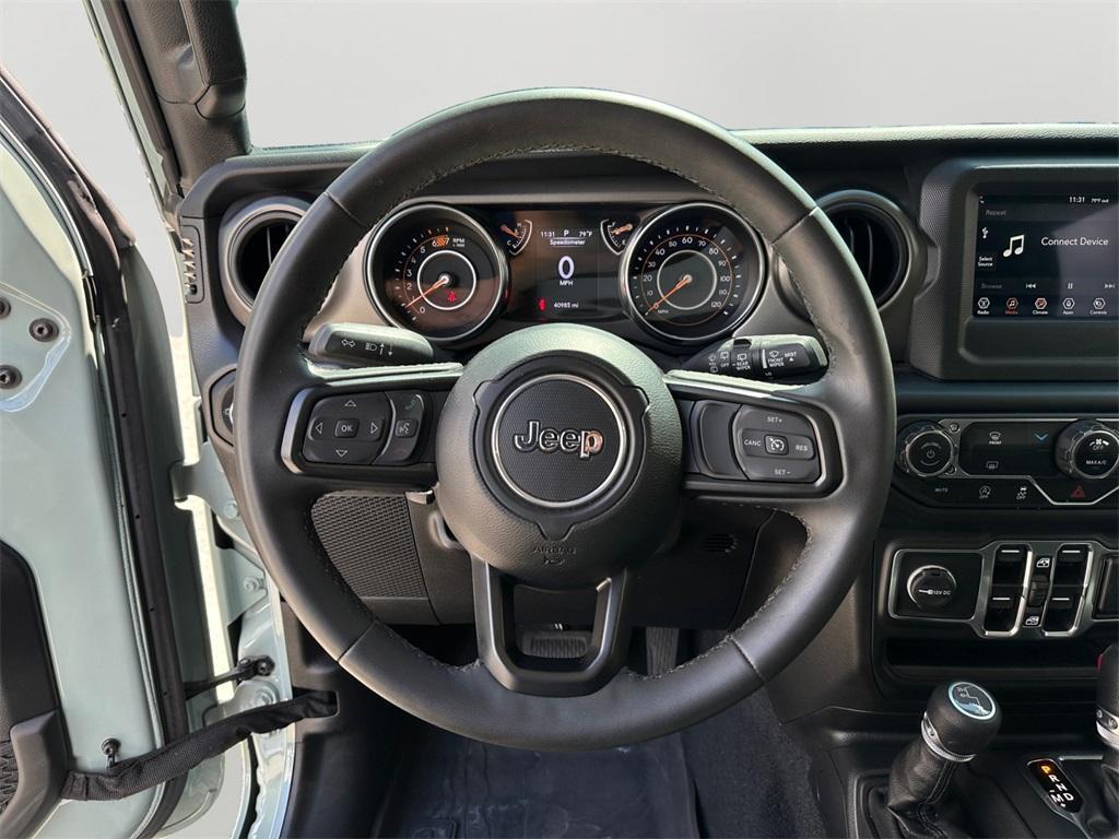 used 2023 Jeep Wrangler car, priced at $35,870