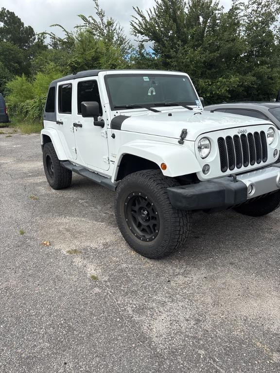 used 2015 Jeep Wrangler Unlimited car, priced at $20,718