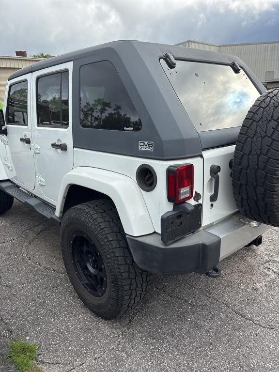 used 2015 Jeep Wrangler Unlimited car, priced at $20,718