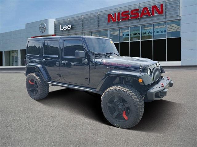 used 2016 Jeep Wrangler Unlimited car, priced at $29,400