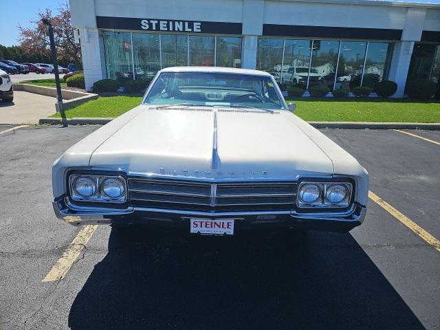 used 1965 Oldsmobile Starfire car, priced at $12,977