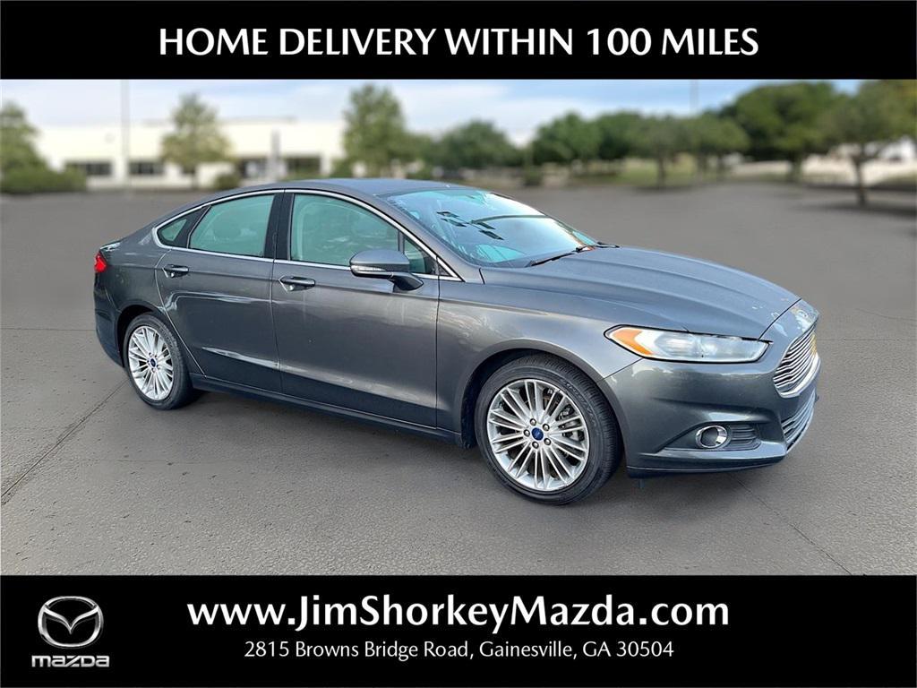 used 2016 Ford Fusion car, priced at $7,999