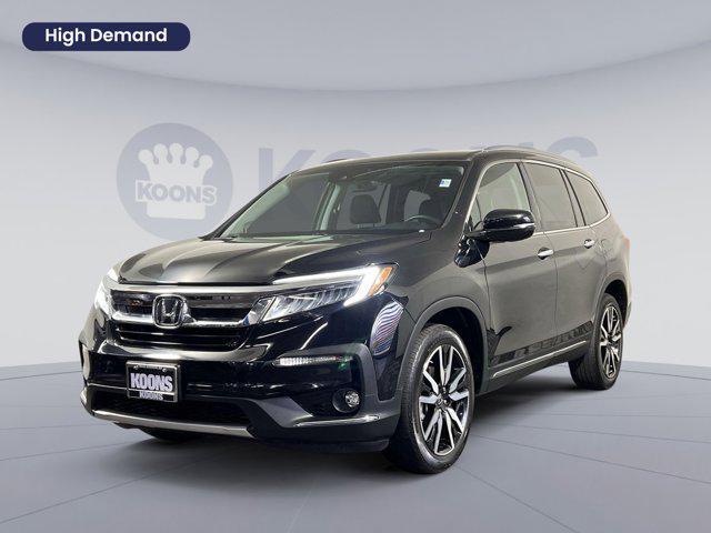 used 2021 Honda Pilot car, priced at $29,394