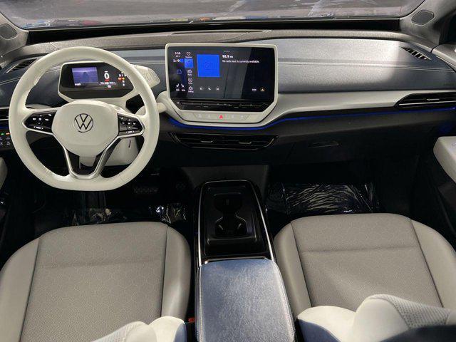 used 2023 Volkswagen ID.4 car, priced at $25,593