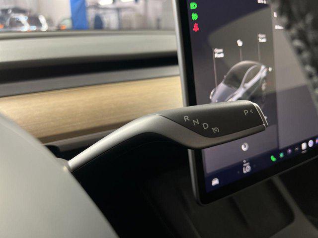 used 2023 Tesla Model Y car, priced at $31,000