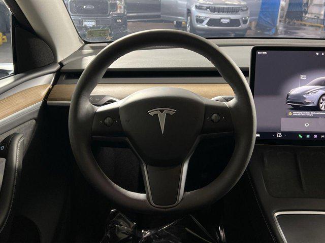 used 2023 Tesla Model Y car, priced at $31,000