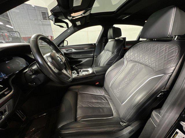 used 2022 BMW 745e car, priced at $36,464