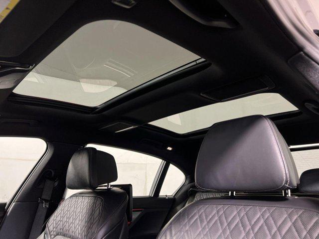 used 2022 BMW 745e car, priced at $36,464