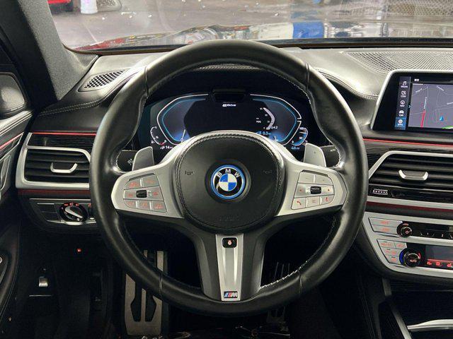 used 2022 BMW 745e car, priced at $36,464
