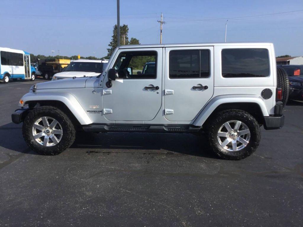 used 2012 Jeep Wrangler Unlimited car, priced at $16,990