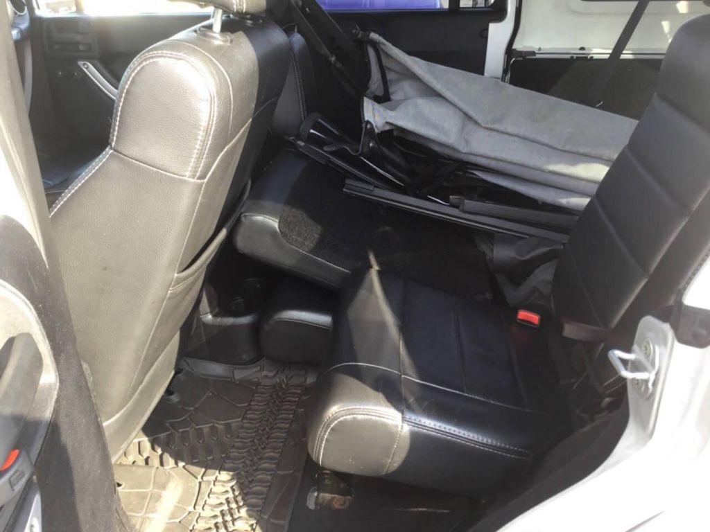 used 2012 Jeep Wrangler Unlimited car, priced at $16,990