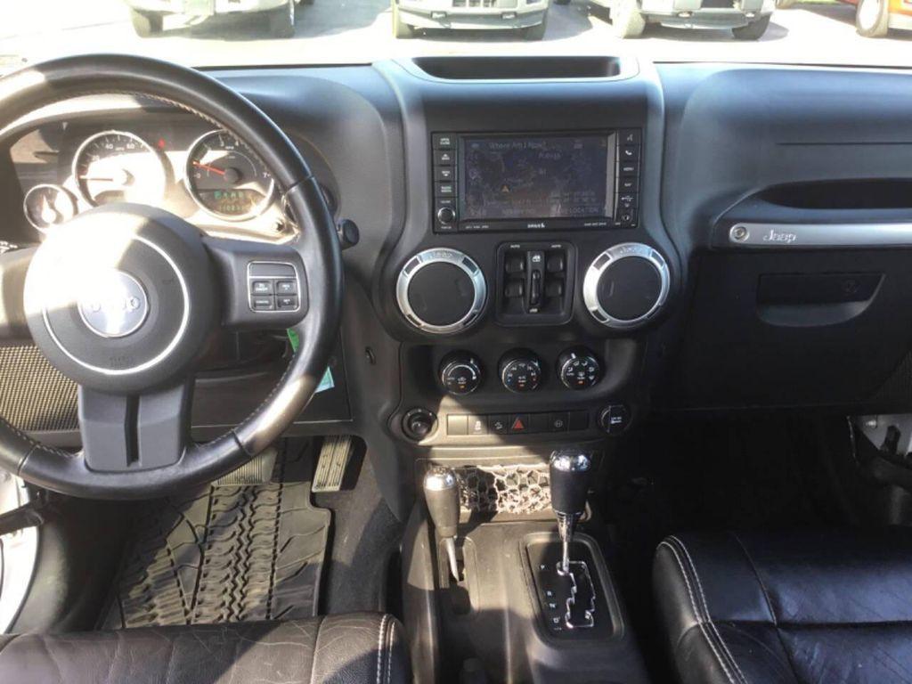 used 2012 Jeep Wrangler Unlimited car, priced at $16,990