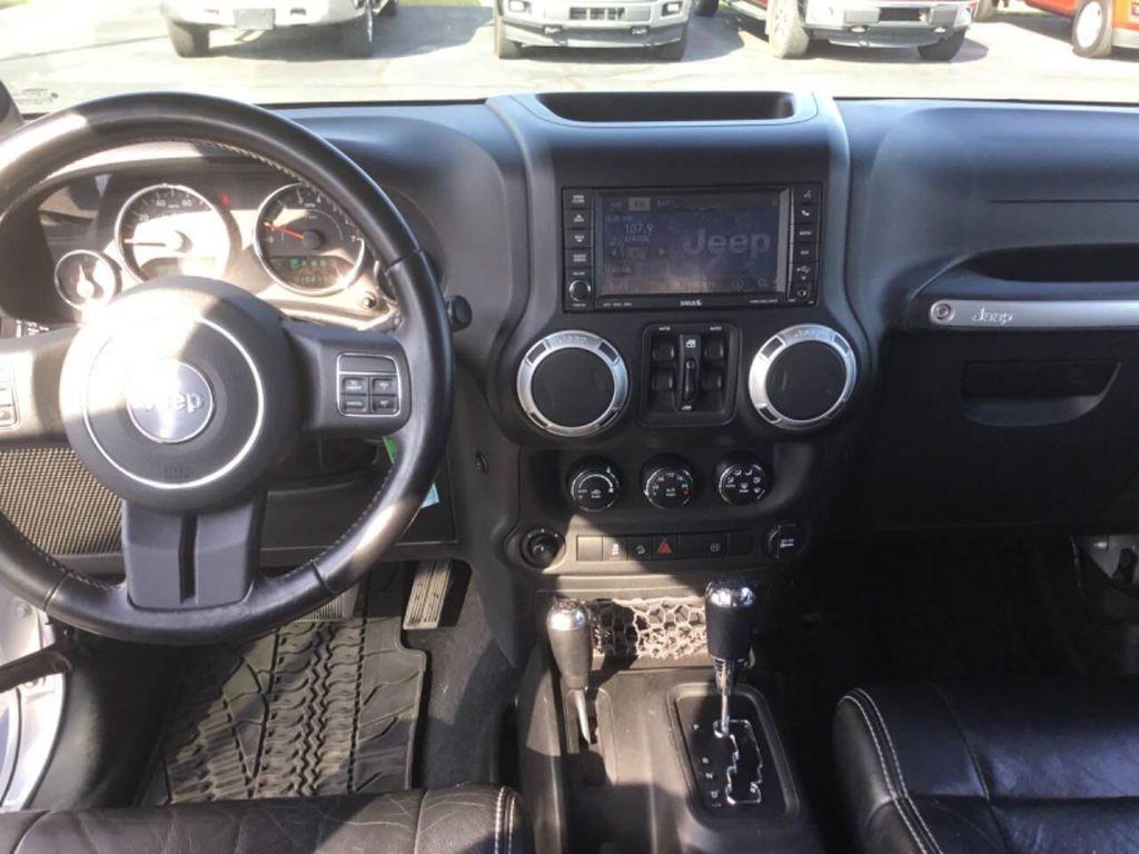 used 2012 Jeep Wrangler Unlimited car, priced at $16,990