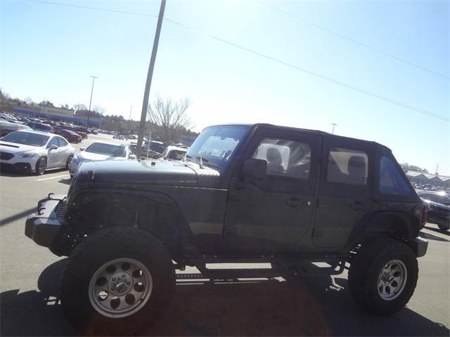 used 2012 Jeep Wrangler Unlimited car, priced at $18,475