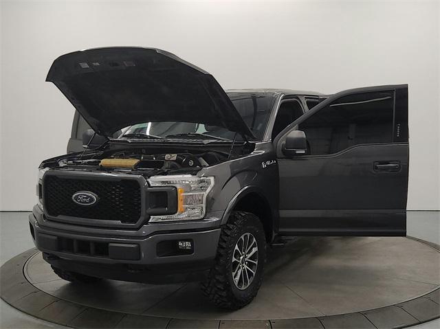 used 2018 Ford F-150 car, priced at $25,453